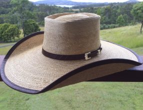 The Dundee Hat on a balcony