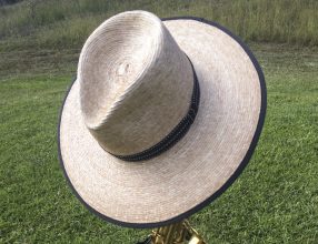 Gansta Hat on a saxaphone